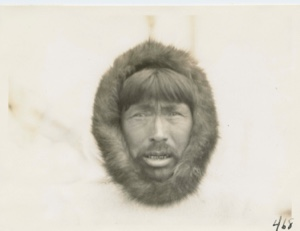 Image of Eskimo [Inuit] man with fur about face